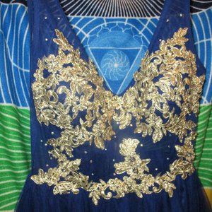 BA Nites Royal Blue dress with gold flower detail.